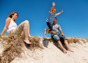 mixed race family enjoying their summer vacation outdoors BpA 1I4Yg