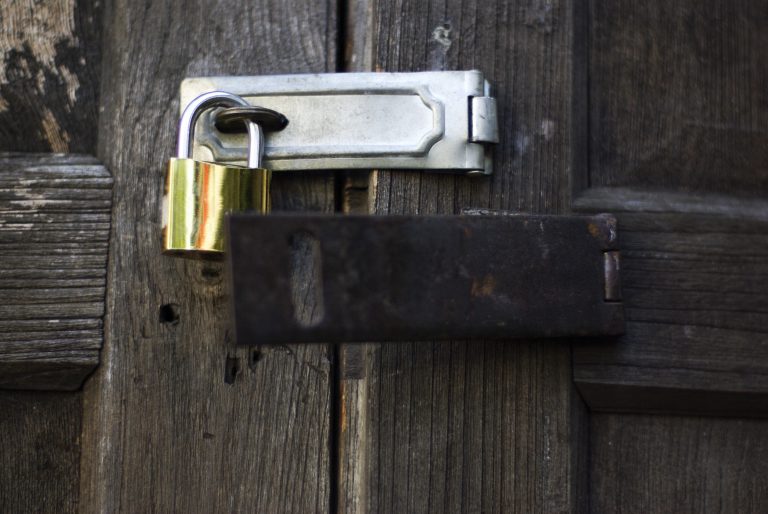 Lock key on vintage wooden door